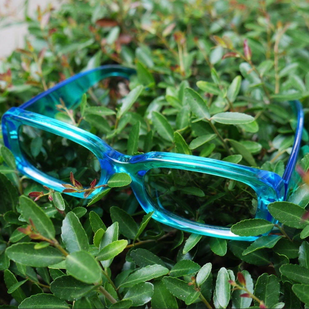 Sunglasses with clear blue frame
